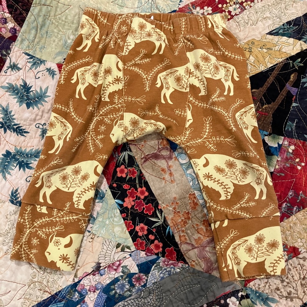 Kate Quinn buffalo print panda pants